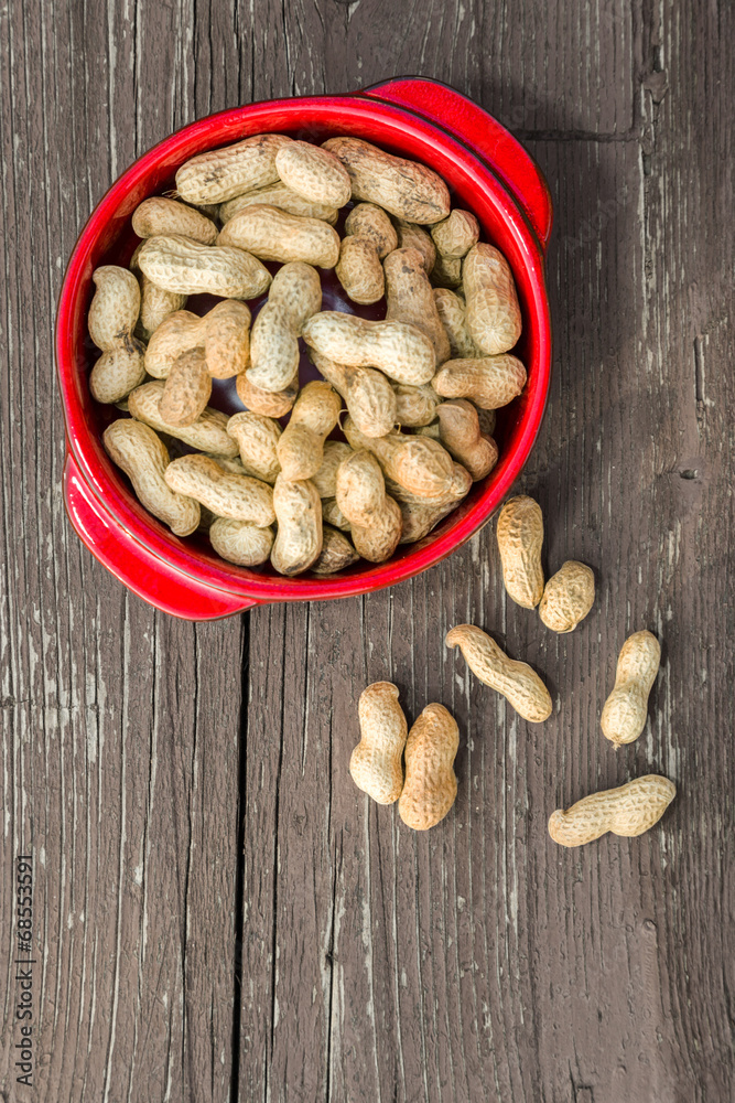 Peanuts on wooden table in the backyard Peanuts on wooden table in the backyard