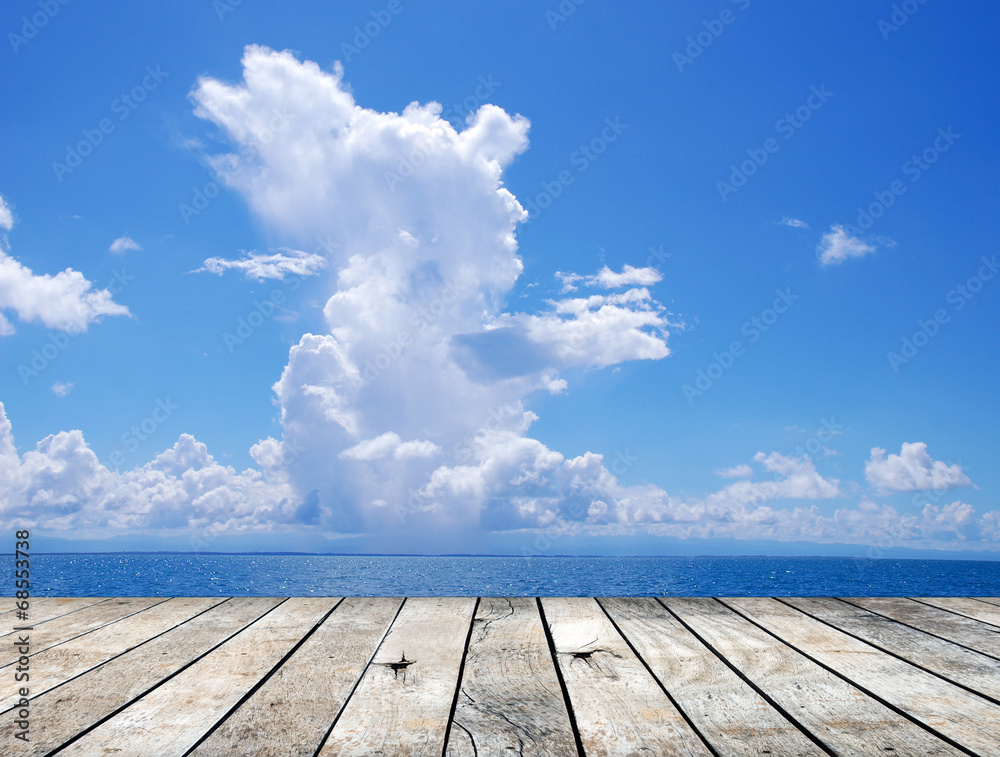 Paving wood floor with cloud and blue sky