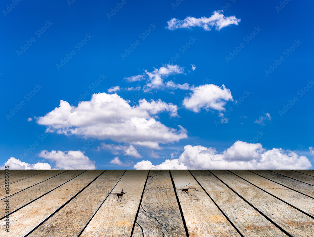 Paving wood floor with cloud and blue sky Paving wood floor with cloud and blue sky