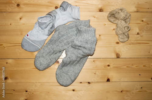 Dirty Socks on Wooden Floor Stock Photo