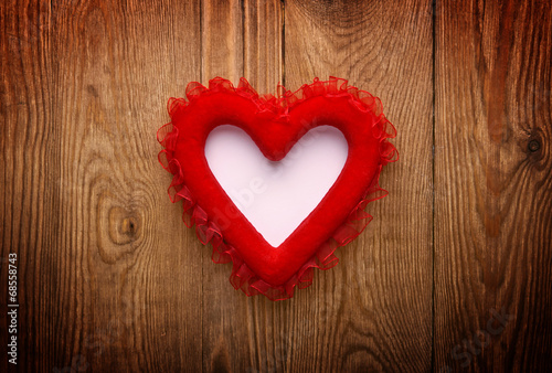 red heart on wood with copy space