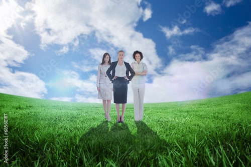 Composite image of team of businesswomen looking at camera © WavebreakMediaMicro