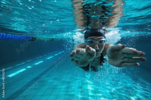 Fotografie, Obraz Athletic swimmer training on her own