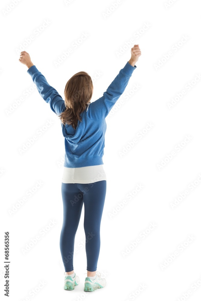 Rear view of young woman stretching her hands Rear view of young woman stretching her hands