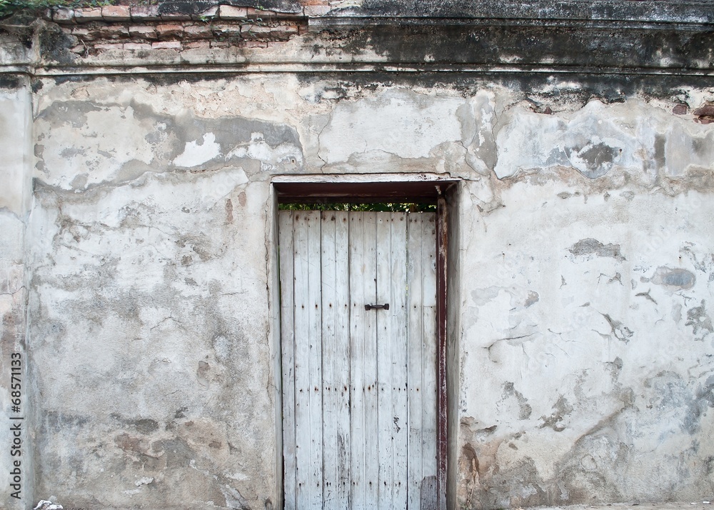 Old door on the old walls.