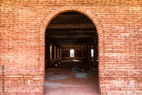 Entrance door and window openings of the old red brick wall