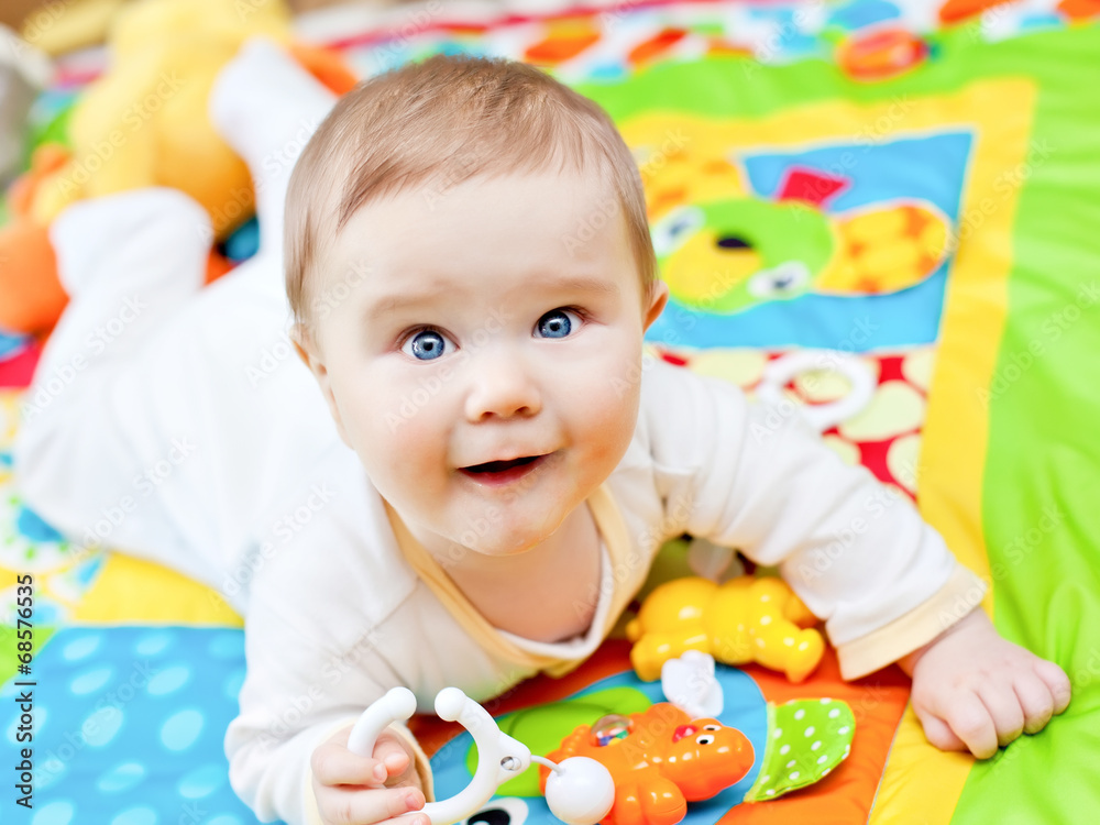 Infant boy on playmat Infant boy on playmat
