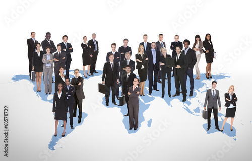 Multiethnic Business People Standing On World Map