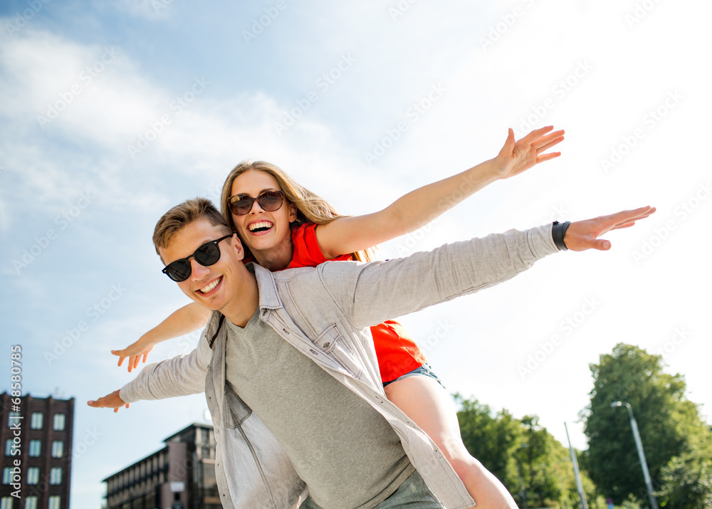 smiling couple having fun in city smiling couple having fun in city