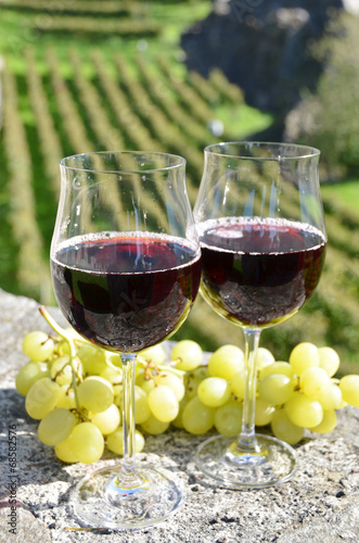 Pair of wineglasses and grapes. Bellinzona, Switzerland