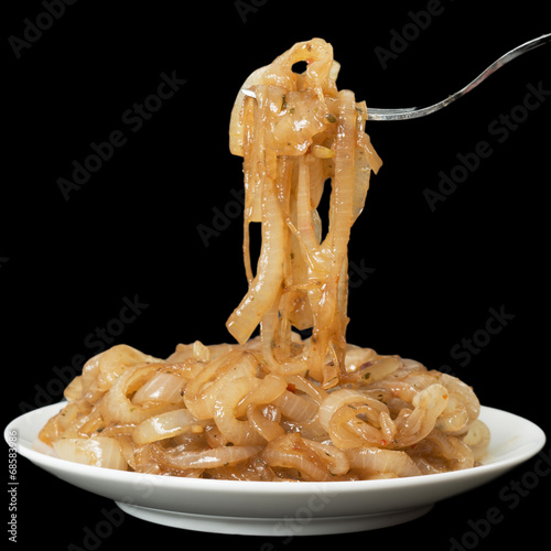 Photos Caramelized Onions isolated on black background