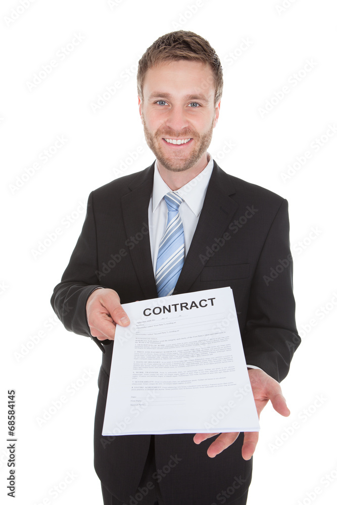 Confident Businessman Holding Contract Paper Confident Businessman Holding Contract Paper