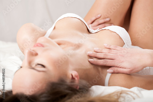 Beautiful woman lying in underwear
