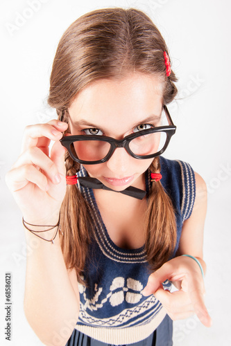 Teenager nerdy girl telling someone off photo