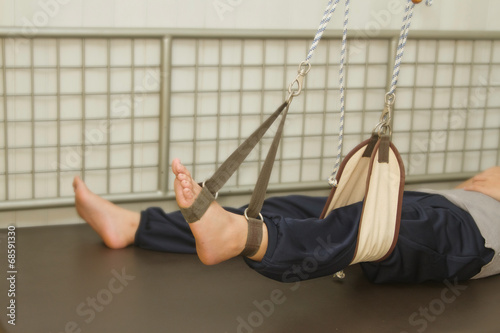 leg exercise with suspension set for rehab muscle strength