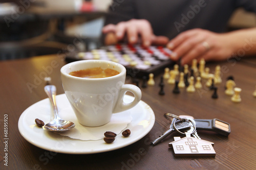 Cup of coffee and chess