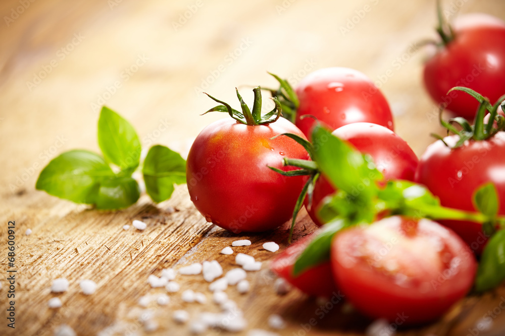 Tomatoes lying on old table. Diet food Tomatoes lying on old table. Diet food