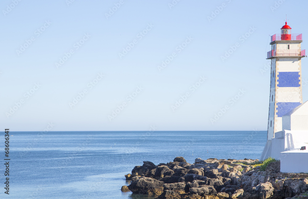 beautiful lighthouse in Cascais seaside, Portugal - obrazy, fototapety, plakaty 