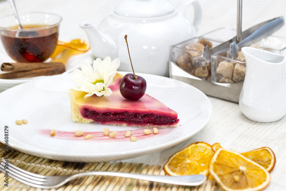 piece of cherry pie on a table in a restaurant piece of cherry pie on a table in a restaurant