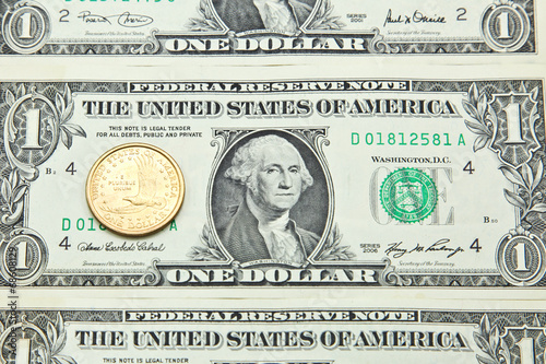 One US dollar banknotes and coin