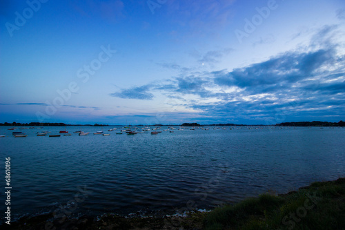 ocean and blue sky to the night