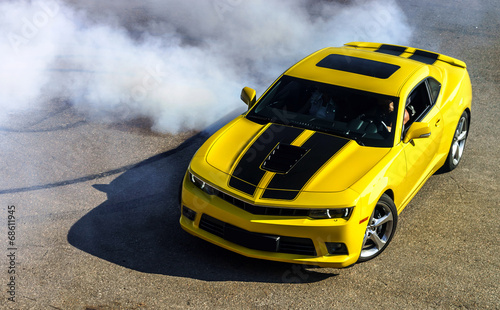 Fototapeta Naklejka Na Ścianę i Meble -  Luxury yellow sport car