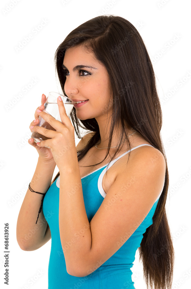 Pretty latin girl drinking water from a glass Pretty latin girl drinking water from a glass