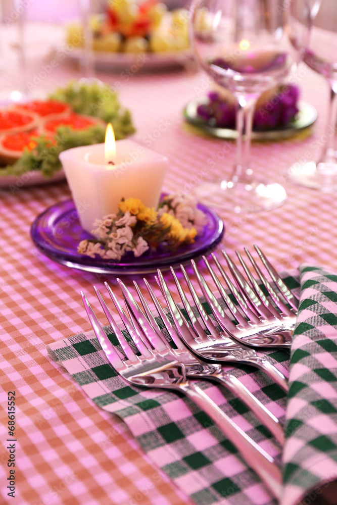 Buffet table with dishware waiting for guests Buffet table with dishware waiting for guests