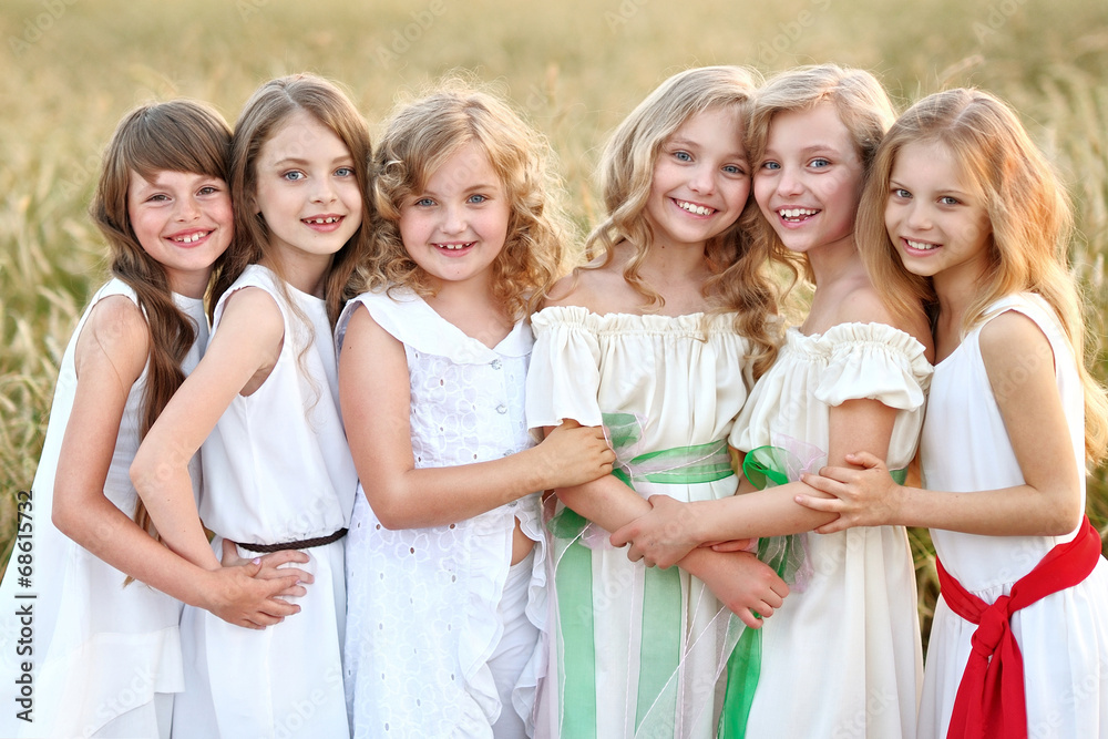 portrait of six little girls in cornfield field portrait of six little girls in cornfield field