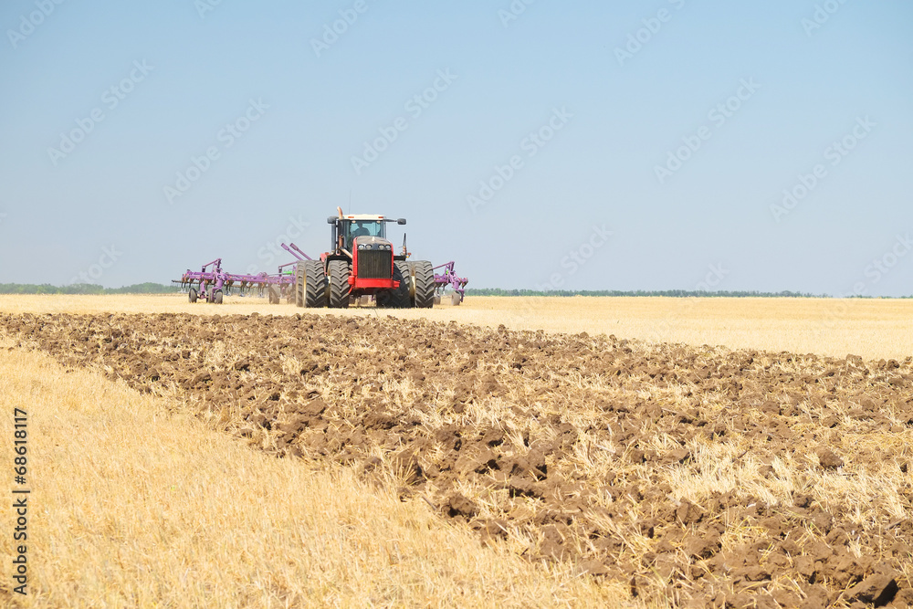 Fototapeta premium tractor with a plow