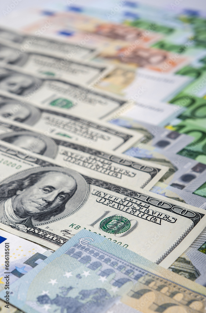 World Currency Concept: Closeup of European and the US Hard Curr World Currency Concept: Closeup of European and the US Hard Curr