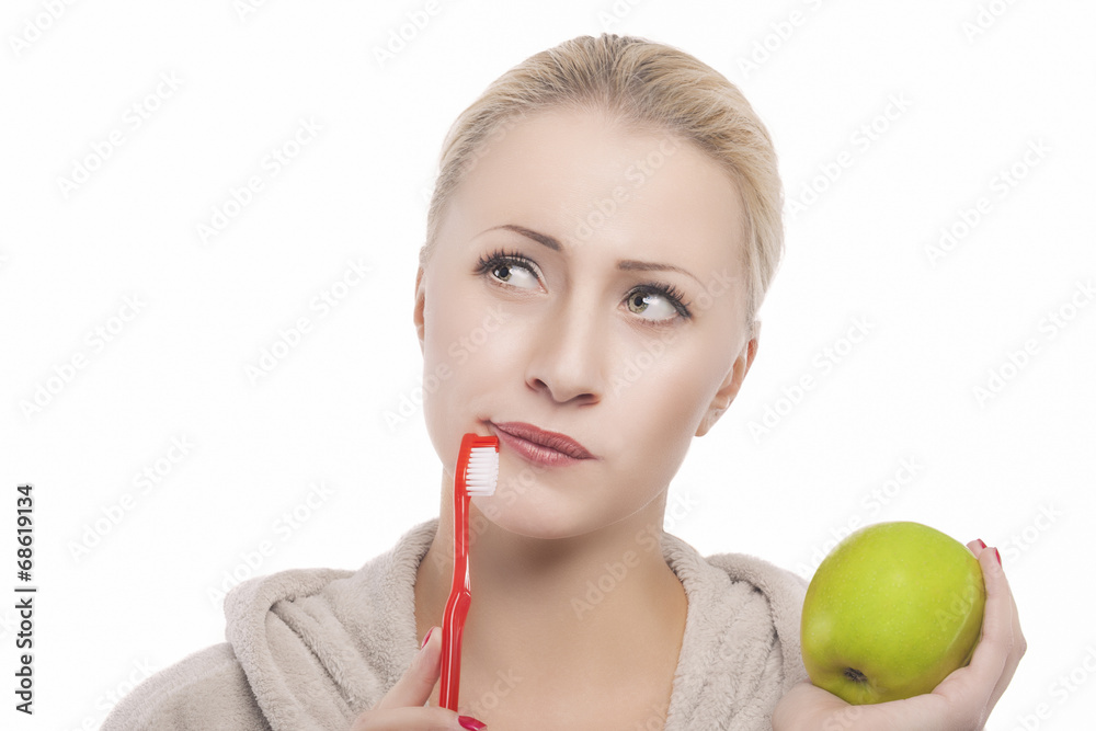 Blond Woman in Dressing Gown Holding Green Apple Prior to Her Te Blond Woman in Dressing Gown Holding Green Apple Prior to Her Te