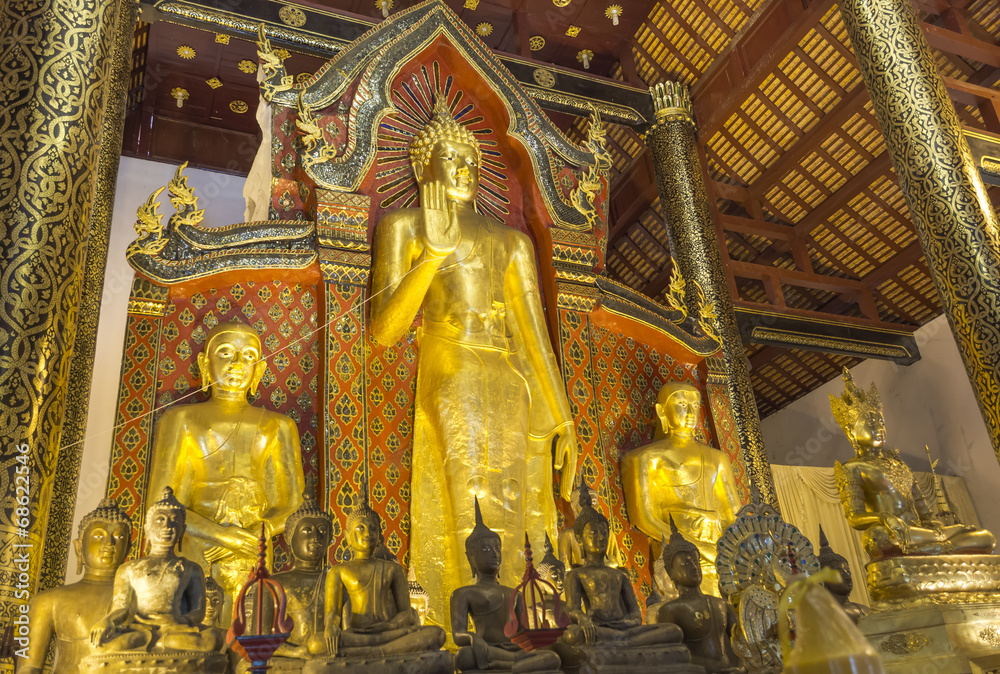gold Buddha  statue in temple of Thailand.