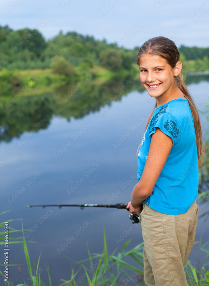 Cute Woman is Fishing with Rod on Lake Stock Image - Image of