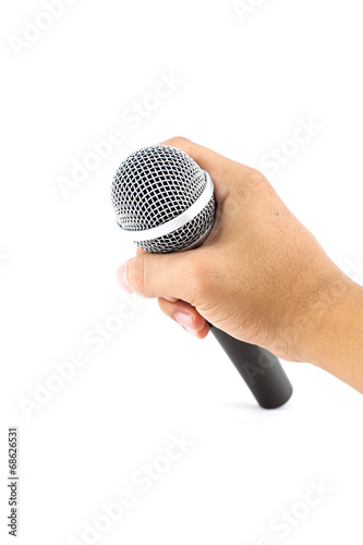 hand with a microphone isolated on white