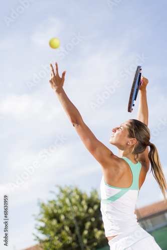 Young woman playing tennis