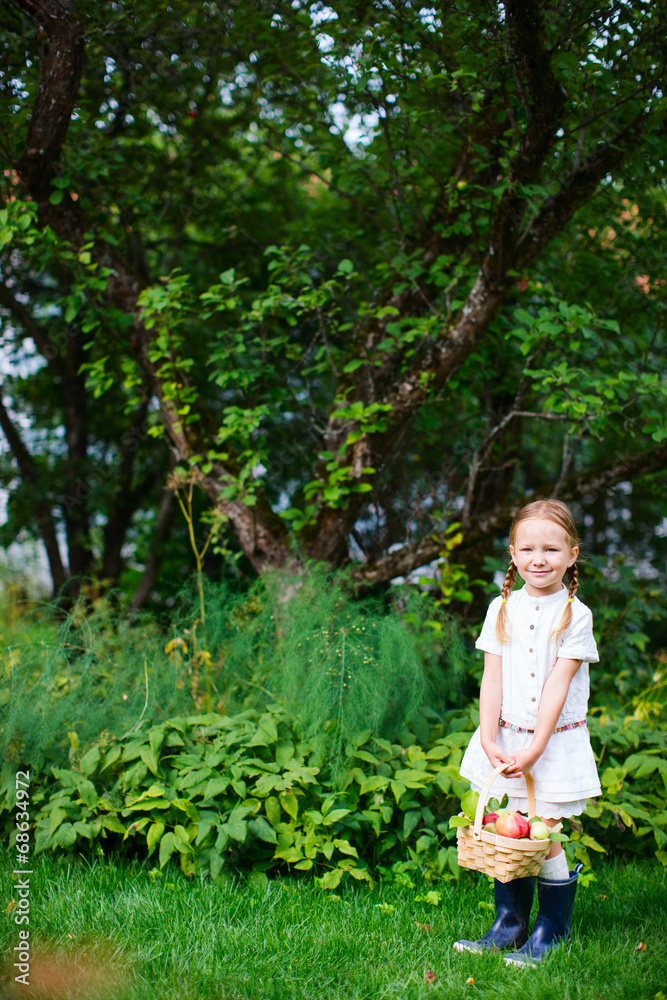 Little girl with apples Little girl with apples
