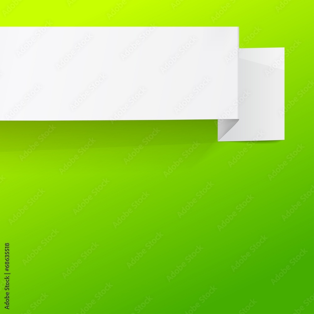 White sheet of paper on a green background. Origami banner. White sheet of paper on a green background. Origami banner.