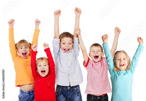 Happy kids with their hands up