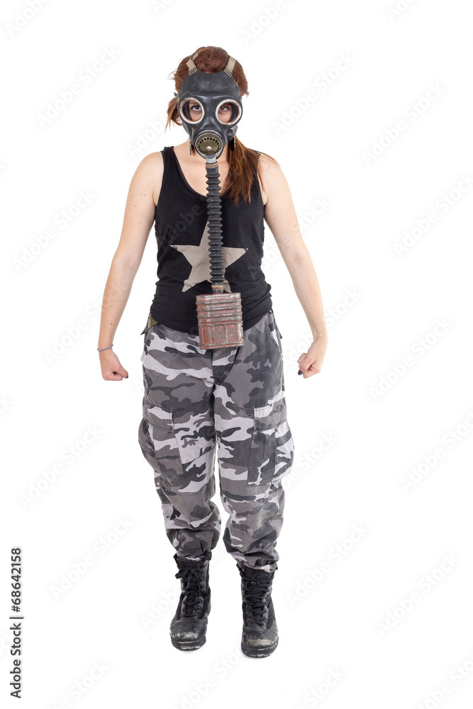 Military young woman wearing gas mask and uniform