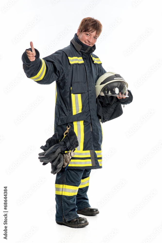 Feuerwehrfrau zeigt Daumen hoch Feuerwehrfrau zeigt Daumen hoch