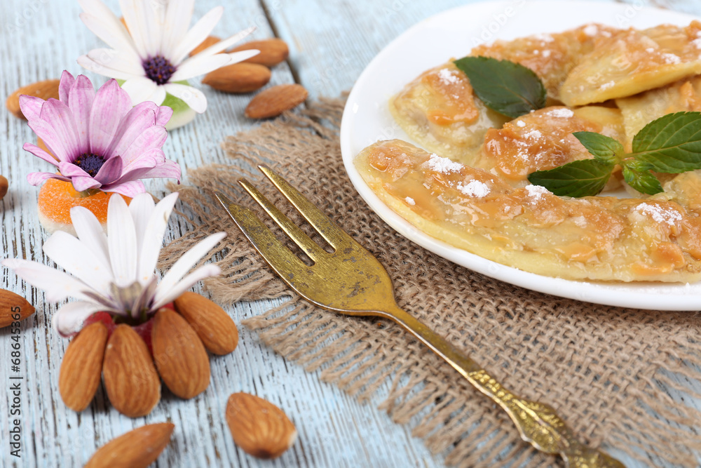 Sweetened fried banana on plate, close-up