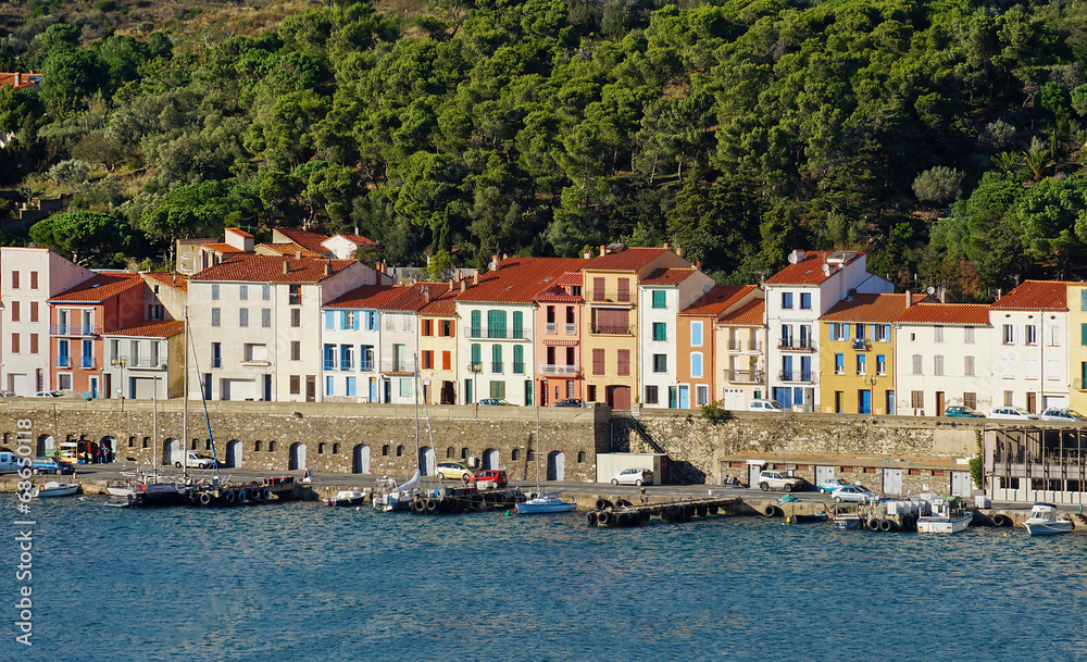 Colorful waterfront houses in a French harbor