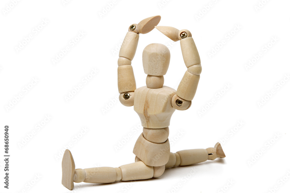 Fototapeta premium wooden dummy doing gym poses