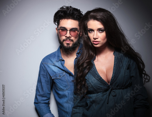 dramatic young couple in casual slothes