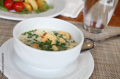 Vegetable soup Cauliflower with breadcrumbs and parsley