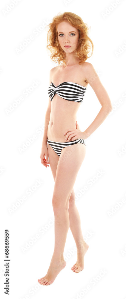 Young woman with slim body in swimsuit isolated on white Young woman with slim body in swimsuit isolated on white
