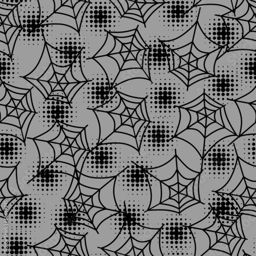 Seamless halloween pattern with spiderweb in halftones.