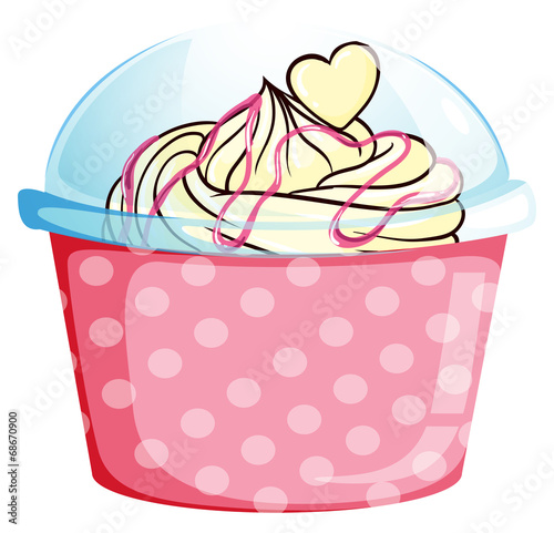 A sweet cupcake inside the pink container