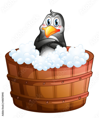 A barrel with a penguin